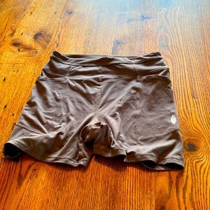 Free People hi-waisted bike shorts with pockets and exterior logo. Medium
